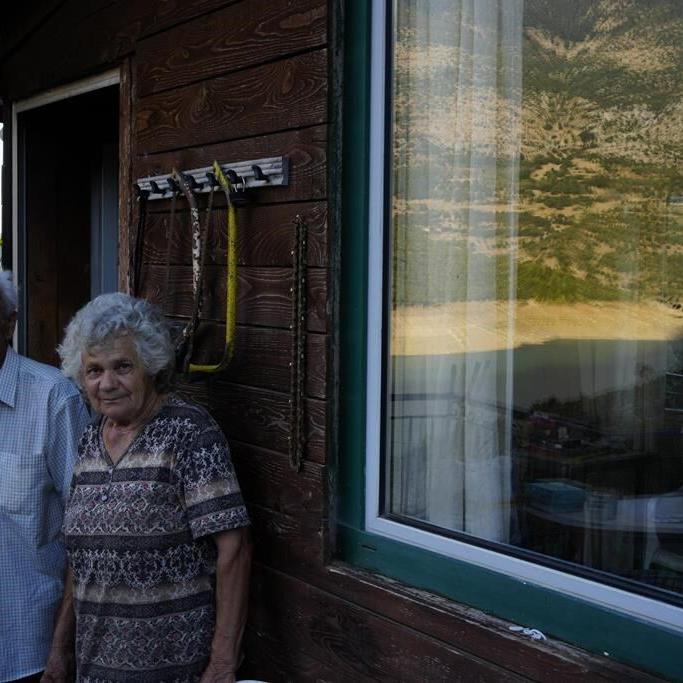 Ruins of a long-sunken Greek village emerge as drought saps a vital reservoir